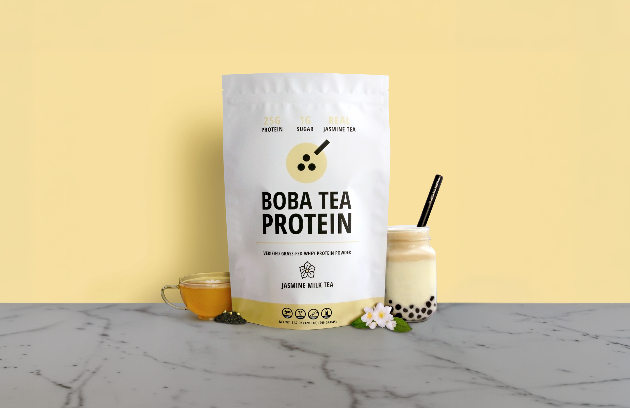 Boba Tea Protein package with a glass of milk tea on a yellow background