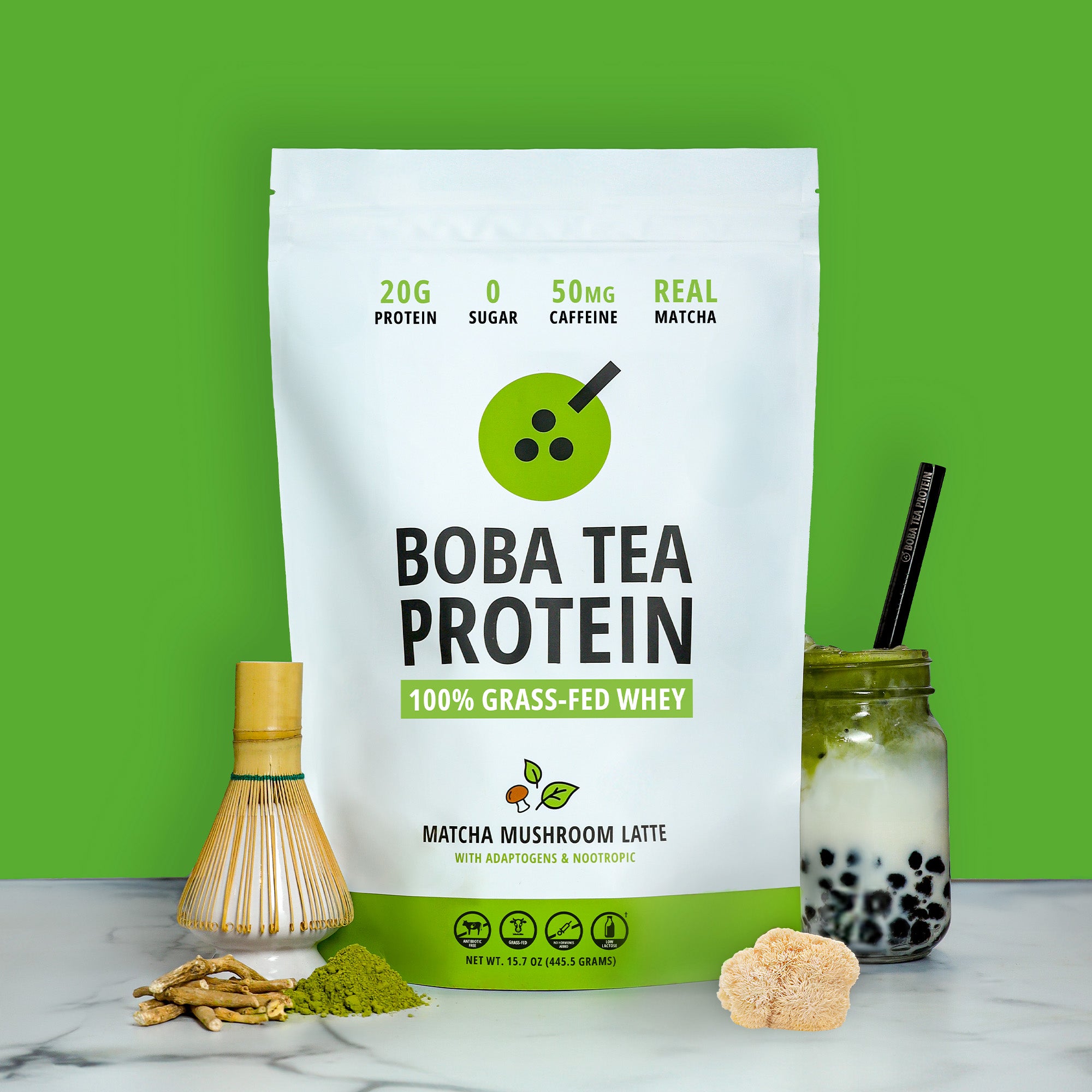Boba tea protein powder package with matcha and adaptogen ingredients on a green background
