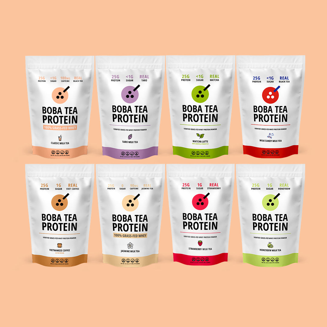Assorted Boba Tea Protein packages on a peach background