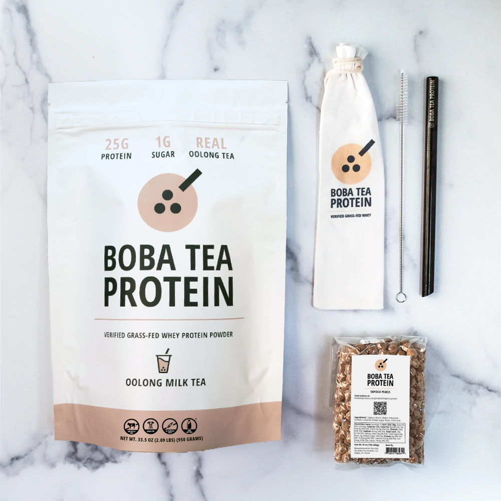 Boba Tea Protein whey protein, metal straw, and tapioca pearls on a marble background