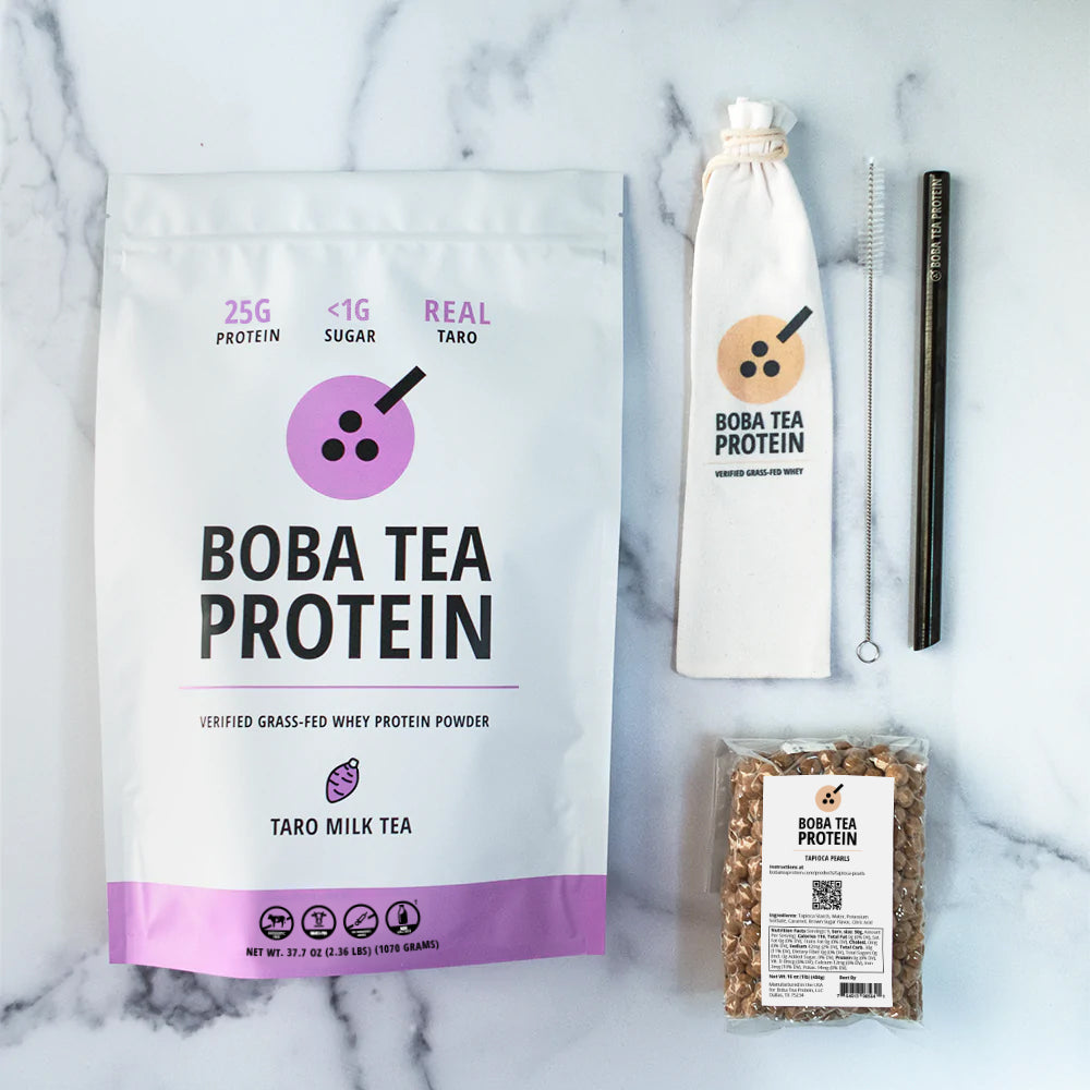 Boba Tea Protein whey protein, metal straw, and tapioca pearls on a marble background