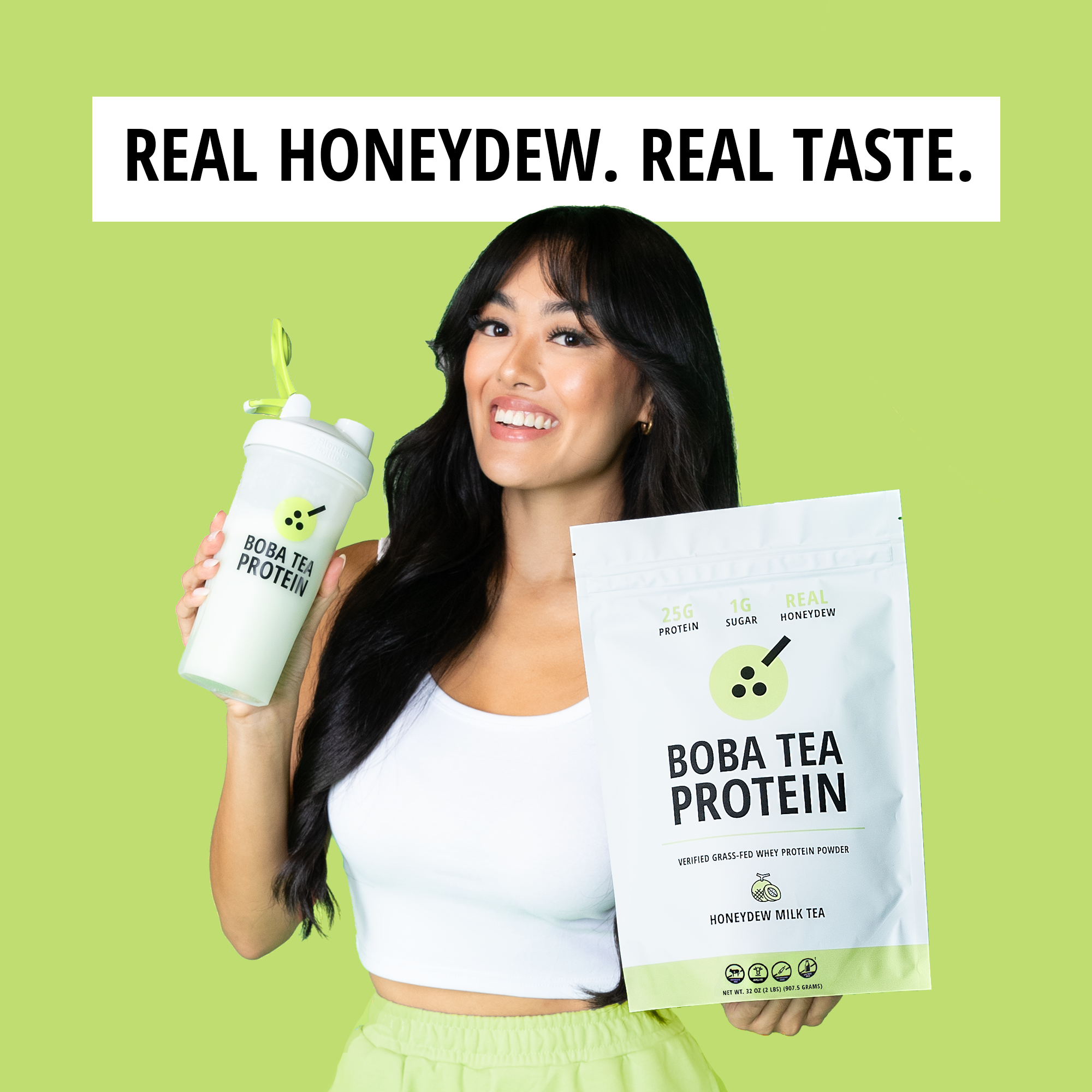 Woman holding Boba Tea Protein packaging and a white tumbler with green straw on a green background, with text that says "Real Honeydew. Real Taste."