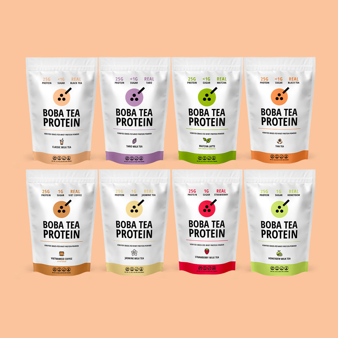 Assorted Boba Tea Protein packages on a peach background
