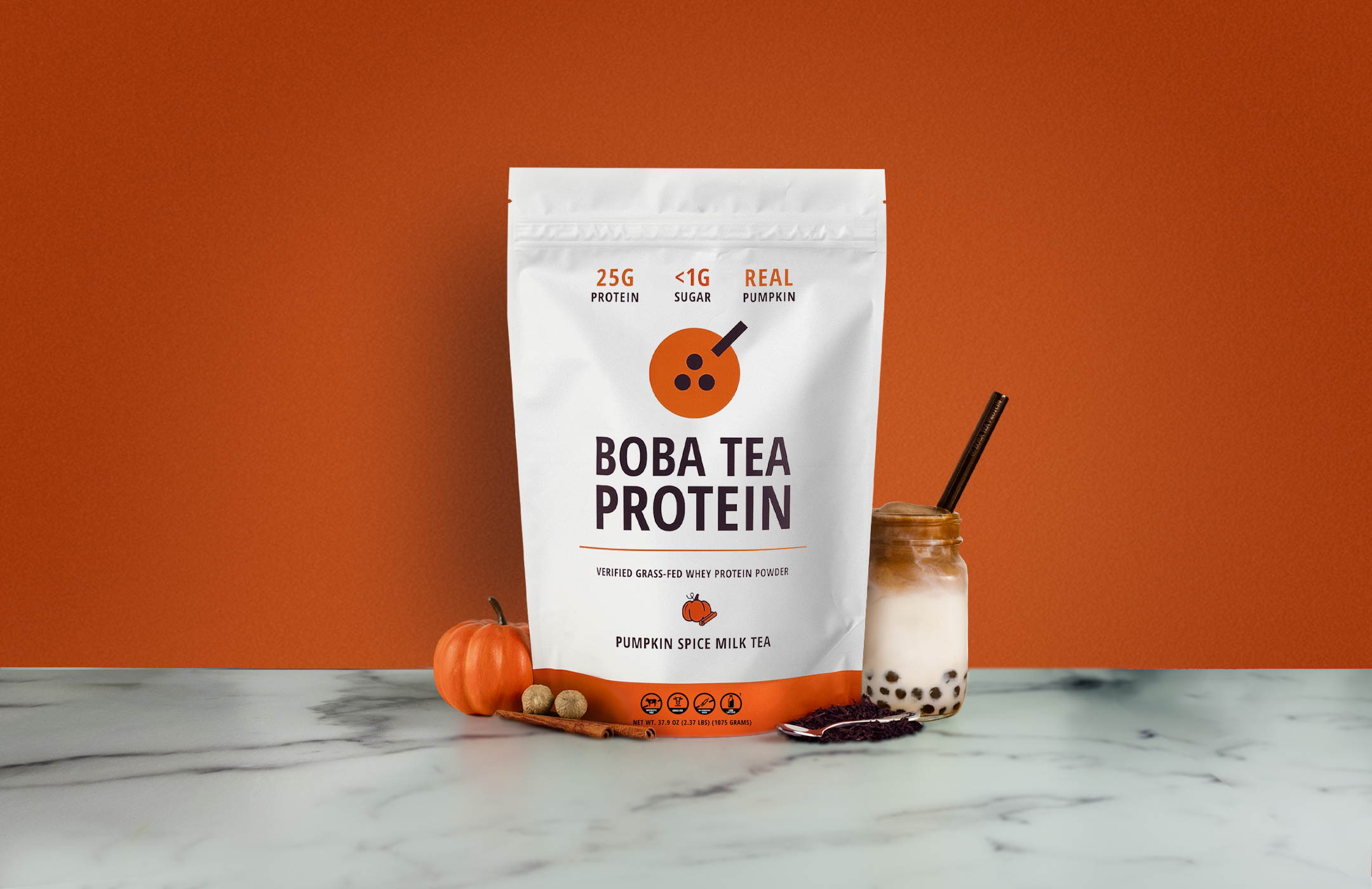 Bobab Tea Protein package with a pumpkin spice milk tea on an orange background